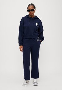 GAP Petite HERITAGE - Treniņtērpa apakšdaļas - navy
