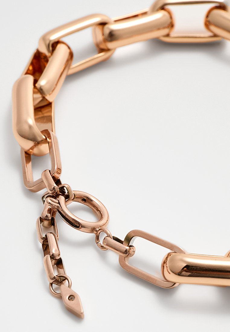 Massiver Armband aus roségoldener Kette mit glatten, polierten Gliedern. Verfügt über einen Verschluss mit einem runden Toggle und einer spitzen Enden für sicheren Halt.