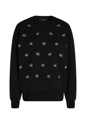 Sweatshirt noir avec un col rond et des motifs brodés blancs dispersés. Fabriqué en tissu doux avec des poignets et un ourlet côtelés.
