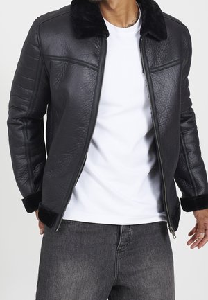 Giacca in similpelle - black
