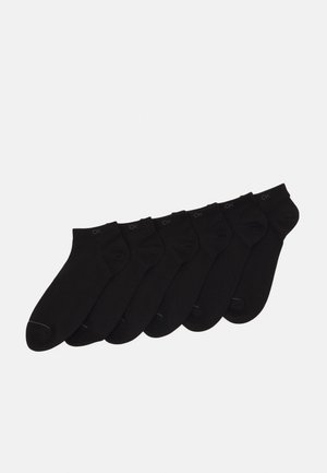 Black cotton ankle socks arranged in a row, featuring a reinforced toe and CK logo on the ribbed cuff. Set of seven pairs.