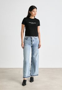 Calvin Klein Jeans INSTITUTIONAL GRAPHIC - Print T-shirt - black