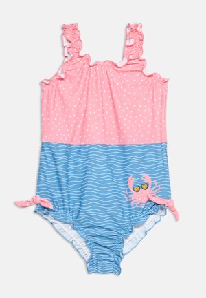 Rosa-blauer Babysanztug mit weißen Punkten, Rüschen-Schulterriemen, seitlichen Knotenbändern und einem Krebs mit herzförmiger Sonnenbrille als Design.