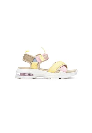 Sandalia deportiva de puntera abierta con tiras en amarillo pastel, rosa, azul y beige y suela blanca acolchada con cojín de aire visible en el talón.