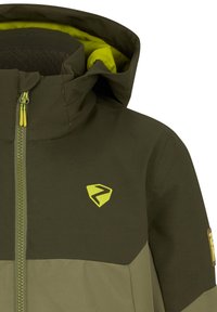 Kapuzenshirt in dunkelolivgrün mit hellolivenen Paneelen. Verfügt über ein strukturiertes Futter, einen Reißverschluss und ein gelbes Logo auf der Brust.