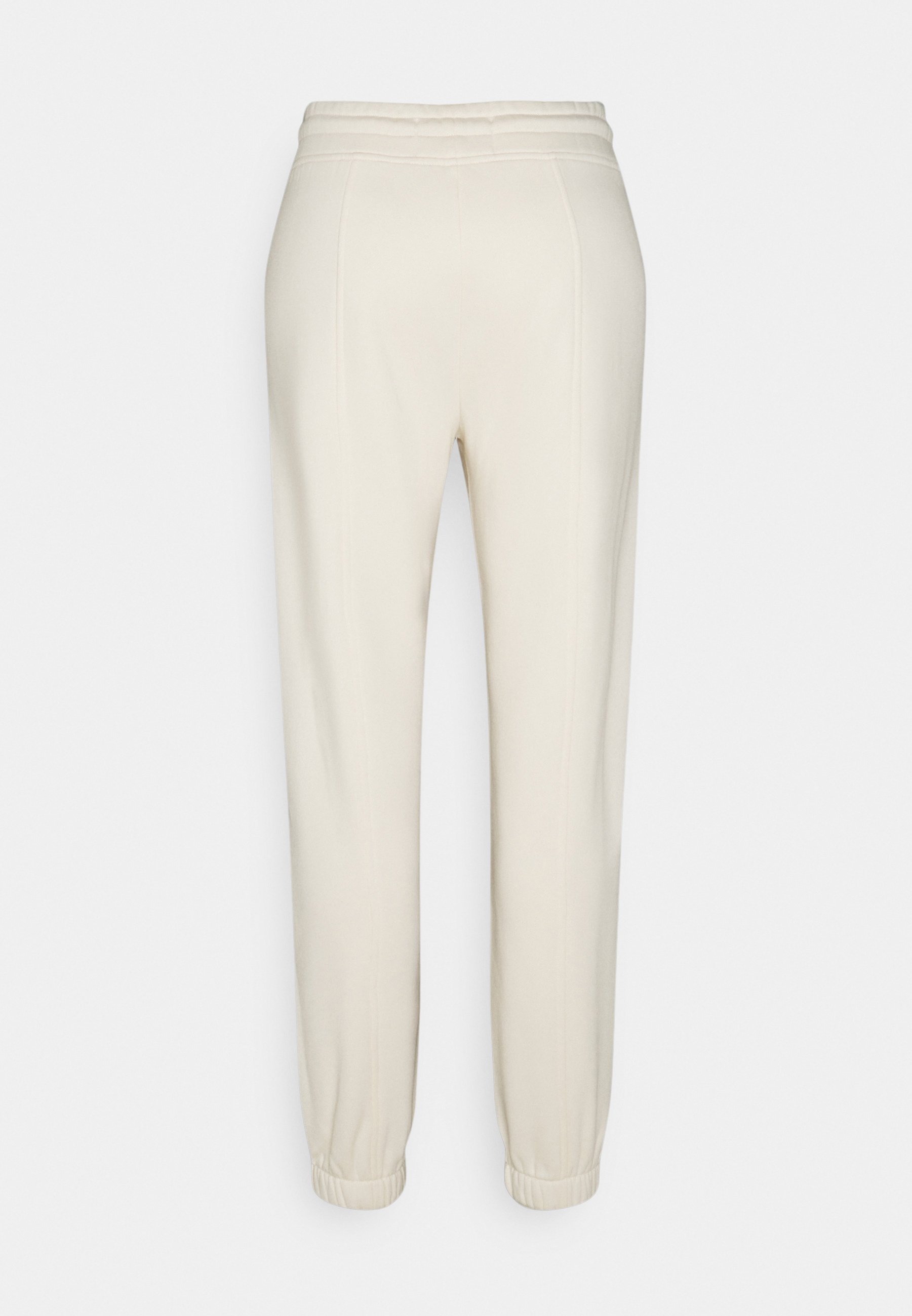 Calvin Klein Jeans OFF PLACED MONOGRAM PANT - Pantaloni sportivi -  beige/avorio - Zalando.it