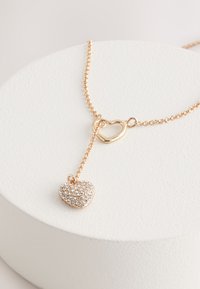 Non sélectionné, gold tone