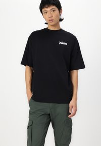 Jack & Jones JPSTPAUL FLAKE - Cargo trousers - urban chic