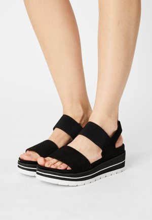 Sandali con plateau - black