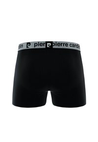 Boxers noirs en tissu à côtes avec une ceinture grise portant le texte "pierre cardin" et un logo carré noir centré à l'arrière.