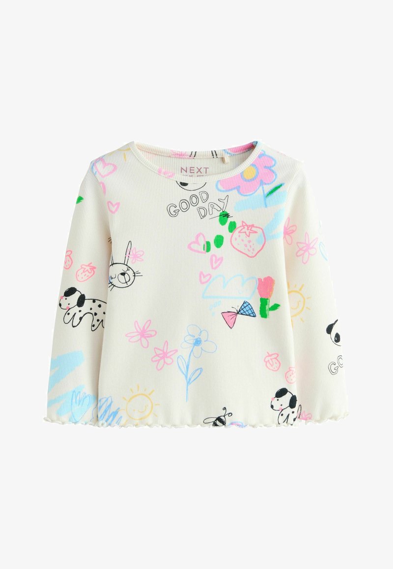 Wit geribd shirt met lange mouwen en multicolore cartoonpatronen, waaronder bloemen, dieren en speelse tekst. Detail van geschulpte zoom.