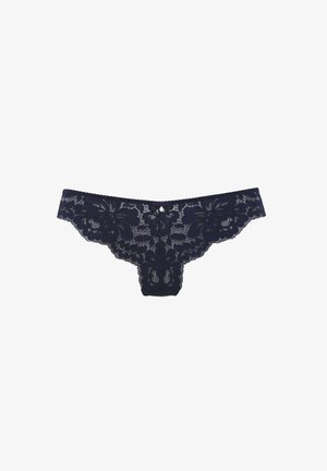 Perizoma in pizzo blu navy con motivi floreali, bordi ondulati e un piccolo gioiello decorativo al centro davanti. Tessuto morbido e trasparente.