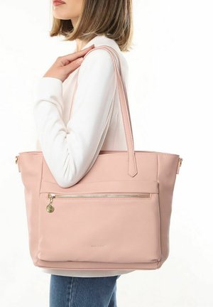 Roze leren tote bag met een ritsvak aan de voorkant, lange handvatten en een soepele textuur. Eenvoudig ontwerp geschikt voor casual gebruik.