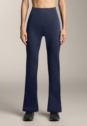 HIGH-RISE COMFORTLUX RIB FLARE - Nadrágok - metallic blue