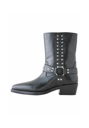 Black leather boots with a pointed toe, featuring a button studded design, a belt with a round buckle, and a stacked heel.