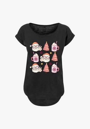 Black T-shirt with repeating pattern of Santa faces wearing glasses and making peace signs, pink Christmas trees, mugs with whipped cream, and stars.