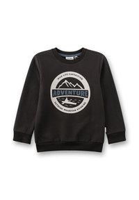 Schwarzer Sweatshirt aus weichem Stoff mit einem kreisförmigen Grafikdesign, das Berge und ein Kajak zeigt. Der Text hebt "ABENTEUER" und "WILDLEBEN EXPEDITION" hervor.