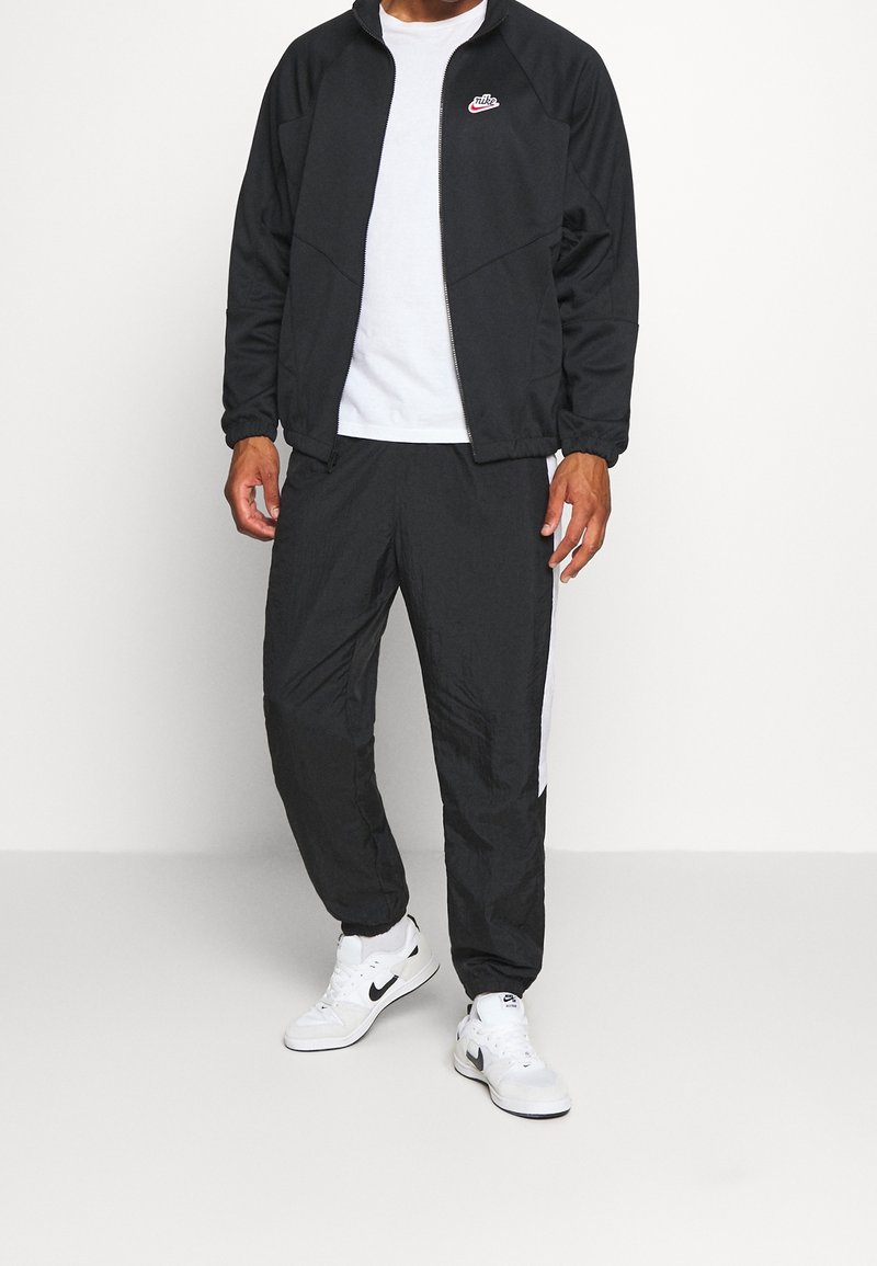 Nike Sportswear Giacca leggera black/nero (Second hand