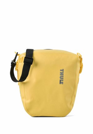 Yellow waterproof shoulder bag with black adjustable strap and Thule logo printed vertically on the front.