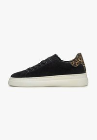 Black suede sneaker with a white rubber sole, featuring a leopard print accent at the heel and black laces. Low-top design.