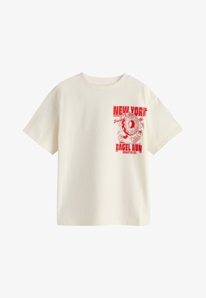 Koszulka z krótkim rękawem w kolorze kremowym z czerwonym nadrukiem biegającego bajgla i napisem "New York Bagel Run Manhattan NYC" na piersi.