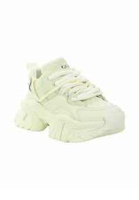 Masywne sneakersy w jasnożółtym materiale syntetycznym. Posiadają grube sznurowadła, teksturowaną podeszwę oraz wyściełany kołnierz. Okrągły kształt z widocznym przeszyciem.
