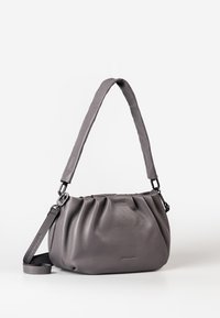 Gray leather shoulder bag with a gathered design, adjustable strap, and black hardware accents. Smooth texture with a structured shape.