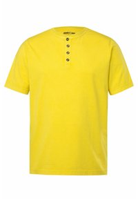 Camiseta amarilla de manga corta con cuello redondo y tapeta de cinco botones. Confeccionada en algodón suave con una textura lisa.