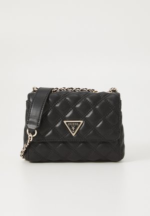 Black quilted faux leather handbag with a diagonal chain strap, featuring a triangular gold hardware logo on the front. Compact rectangular shape.