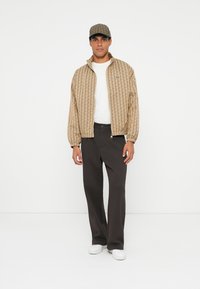 Lacoste Stoffhose - port