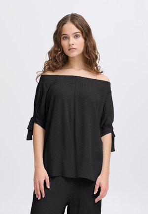 Svart off-the-shoulder topp med vida ärmar, med rynkad textur och knutdetaljer vid manschetterna. Mjuk tyg, avslappnad passform.