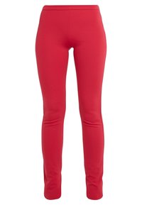 Červené přiléhavé legíny z hladkého, pružného materiálu. Jednoduchý design, žádné viditelné švy nebo vzory, elastický pas pro pohodlí.