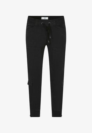 Pantalons de jogging noirs en mélange de coton, avec poches latérales, taille élastique avec cordon de serrage et ourlets de cheville zippés. Texture lisse.