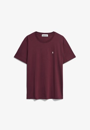 Weinrotes T-Shirt mit kurzen Ärmeln aus Baumwolle. Verfügt über einen runden Ausschnitt und ein kleines weißes Schleifenlogo auf der linken Brust. Weiche Textur.