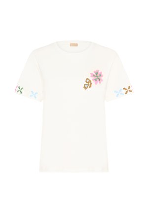 T-shirt en coton blanc avec une broderie florale colorée en rose, vert et bleu sur les manches et la poitrine. Design à col rond, manches courtes.