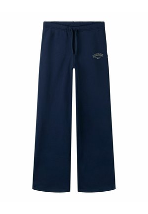 Pantalon de survêtement bleu marine à jambes larges avec taille élastique et cordon, avec un petit logo texte "London" sur le haut de la cuisse gauche.