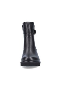 Black leather ankle boot with a smooth texture, rounded toe, and side buckle accent. Features a sturdy sole and minimalist design.
