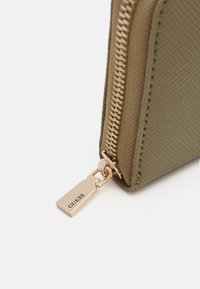 Guess LAUREL MEDIUM ZIP AROUND - Portemonnee - sage