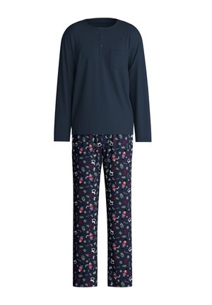 Haut de pyjama à manches longues bleu marine avec une poche, associé à un pantalon à motifs arborant des motifs floraux et fantaisistes sur un fond sombre.