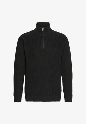 Must have mustriga mustika mustavärvi, peene ribiga tekstuuriga, kõrge krae ja pikad varrukad. Krael on metallist tõmblukk.