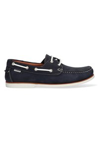 Marineblauwe leren bootshoe met witte stiksels, metalen oogjes en een gestructureerd oppervlak. Voorzien van een witte rubberen zool en een bruine binnenkant.