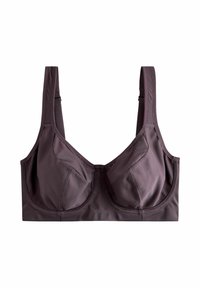 Wireless sports bra in dark purple fabric, featuring textured cups, wide adjustable straps, and seamless finish for comfort and support.