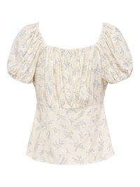 Blouse crème à manches courtes bouffantes, encolure carrée et délicat imprimé floral bleu.