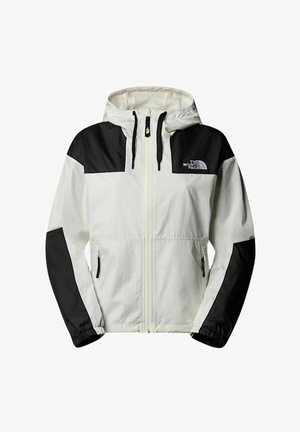 Witte jas met zwarte accenten, een capuchon, volledige rits en trekkoorden. Voorzien van elastische manchetten en ritszakken. Logo's op de borst.