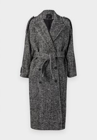 Cappotto trench in motivo pied de poule bianco e nero, con cintura, chiusura doppiopetto e spalline.