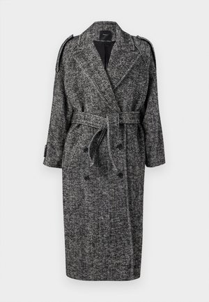 Cappotto trench in motivo pied de poule bianco e nero, con cintura, chiusura doppiopetto e spalline.