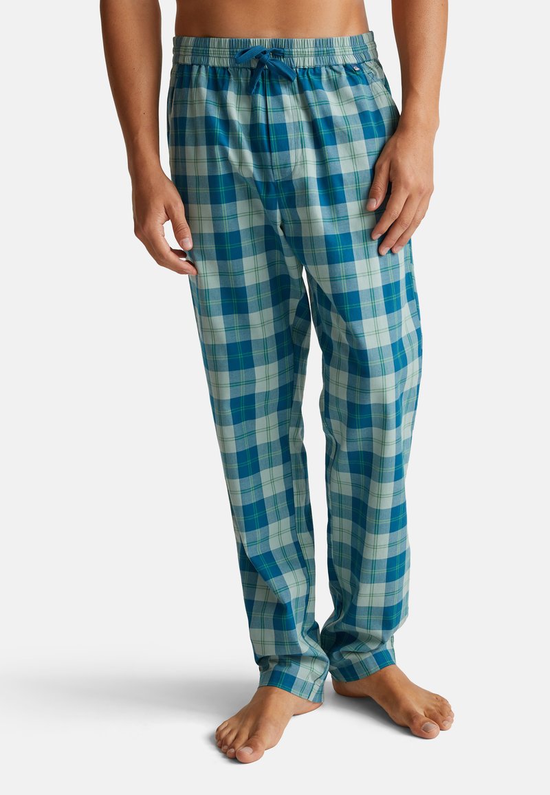 Blauwe en groene geruite pyjamabroek van zachte stof, met een elastische tailleband en een koord, rechte pijpen en zonder zakken.