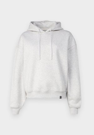 Lysegrå hettegenser med snor i hetten, romslig passform, ribbestrikkede mansjetter og nederkant, myk tekstur, med et logo-lap på den nedre siden.