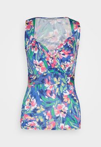Haut bleu sans manches avec motif floral rose, blanc et vert et un design à col en V croisé.