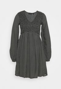 Schwarzes Kleid mit langen Puffärmeln, V-Ausschnitt und gerafftem Oberteil. Es hat ein weißes Blumenmuster auf der gesamten Oberfläche und einen ausgestellten Rock.